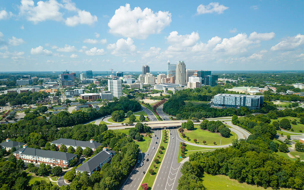 An aerial view of downtown Raleigh, NC on a sunny Spring day